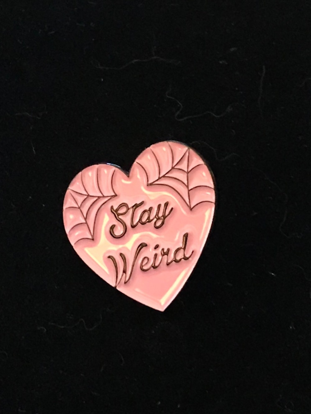 NWOT pink heart with cobwebs “stay weird” pin (pins: 1/$12, 2/$20)